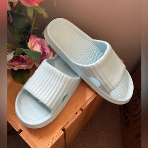 Adult size 37/38 US 7/8 NWOT slip on sandals